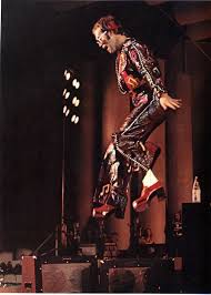 Download The Song Of Elton John Sacrifice Listen To The Track Watch Clip And Find Lyrics Elton John Elton John Costume Concert Outfit
