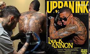 What is nick cannon tattoo on his neck? Nick Cannon Spends 30 Hours Getting More Ink Added To His Back Daily Mail Online