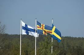 The flag of åland refers to the geographical and political position of the finnish islands of åland. Finland Aland Sweden Flags Photo