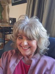 Is there a stylist that can my hair from this to silver grey