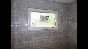 Interior window trim gives another style element and a finished look to rooms. Marble Subway Tile Tub Shower Area With A Window Youtube