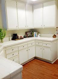 Let S Die Friends Easy Kitchen Cabinet Makeover Kitchen Cabinets Makeover Laminate Kitchen Cabinets Kitchen Renovation