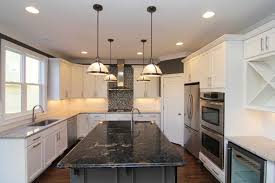 The solid brass trim draws on classic regency forms. Luxury Kitchen Designs That Feature Waterworks