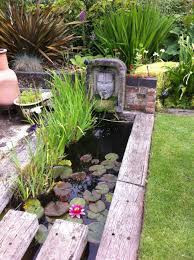 Set the pond aside and cut out the sod (you may need to reuse it later), then start digging a few inches in from the circular outline. This Unusual Water Feature Using Reclaimed Railway Sleepers Has Been Created By My Brother James Ponds Backyard Pond Landscaping Water Features In The Garden