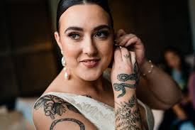 Nonbinary Philadelphia wedding with a stunning red velvet suit • Offbeat  Wed (was Offbeat Bride)