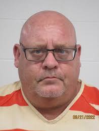 Iowa administrator, 2 former cops face felony charges