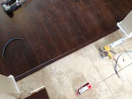 Tile Transition To Laminate Flooring Wood Tile Dark Laminate Floors