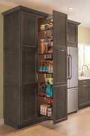 Decorative side and top trim ensure no raw edges show. Thomasville Organization Tall Pantry Pull Out Cabinet