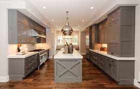 This galley kitchen is given a farmhouse touch with its hanging bell jar edison lamps and coursed bleached brick wall with arched entryway. 75 Beautiful Farmhouse Galley Kitchen Pictures Ideas April 2021 Houzz