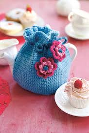 The cable and rib ensure that this cosy is flexible enough to fit most pots. Flower Motif Tea Cosy Crochet Pattern