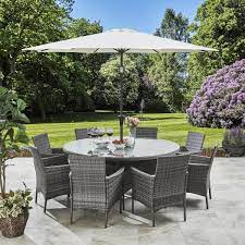 Rattan is one of the world's strongest woods and has been used to make furniture for thousands of years. Kemble 8 Seater Rattan Round Dining Set With Parasol Rattan Garden Furniture Grey Garden Furniture Sets Garden Dining Set Garden Furniture