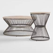 We have incredible sales for outdoor tables, they're going fast. Round Wood And Metal Kearny Table Collection World Market