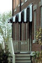 Black And White Striped Retractable Awning Preservation Brief 44 The Use Of Awnings On Historic Buildings Repair Replacement And New Design In 2020 Aluminum Awnings Historic Buildings Awning