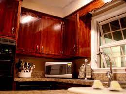 With the right stain, a sander and a rag, your kitchen cabinets can be transformed in days. How To Give Your Kitchen Cabinets A Makeover Hgtv