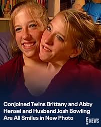 Abby Hensel's husband Josh Bowling recently shared a new photo of himself  with his wife and her conjoined twin sister Brittany Hensel.