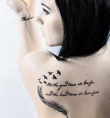 Flying Bird Tattoo On Ribs Pin By Makaelah Nicole On Tattoo S I Want Tattoo Inspiritation With Images Feather With Birds Tattoo Flying Bird Tattoo Feather Tattoos