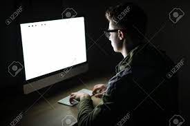 Download and use 39+ dark room computer free images from stockfreeimages many free stock images added daily! Closeup Of Young Man Sitting And Using Blank Screen Computer In Dark Room Stock Photo Picture And Royalty Free Image Image 99405180