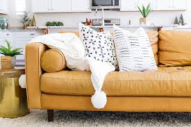 Camel and black are really nice together imo. Why The Sven Sofa Is Perfect For Living In Your Living Room One Lovely Life