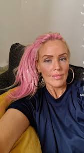 I've been dull , dumb and blonde all my life, , will dying my hair pink  give me a new level of interestingness? Picture taken using a tik tok  filter. Anyone dyed