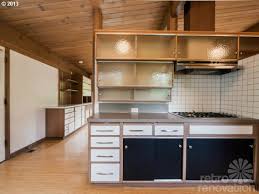 I had the best luck finding midcentury modern cabinet hardware at these online stores: Midcentury Modern Time Capsule House In Portland Oregon