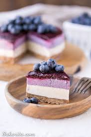 An easy keto raspberry cheesecake recipe, topped with raspberry puree. No Bake Layered Blueberry Cheesecake Gluten Free Paleo Vegan