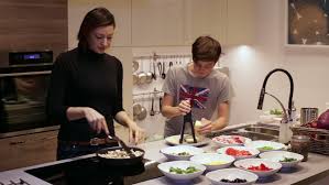 Easy to prepare and unbelievably tasty. Mother Cooking A Dinner With Stock Footage Video 100 Royalty Free 13015382 Shutterstock