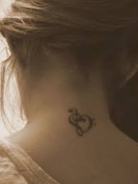 Fun Back Of The Neck Tattoo Where An Upside Down C Major And Bass Clef Make Up A Heart Ilgn Istanbul Neck Tattoo Tattoos Body Art Tattoos