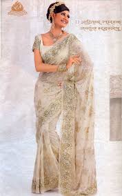A White Wedding Reception Synthetic Fancy Saree With Heavy Embriodery From Rmkv Asian Wedding Outfits Indian Bridal Fashion Indian Bridal Wear