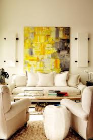 Sometimes muted tones can do an even better job making the room feel spacious while pulling the eye across. 30 Best Living Room Paint Color Ideas Top Paint Colors For Living Rooms