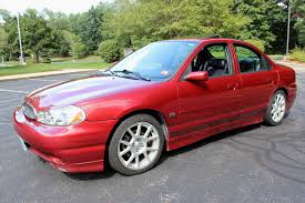 Image result for Dark Toreador Red 1999 Ford