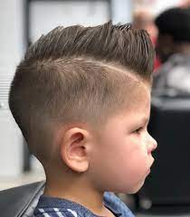 The curly mohawk, one of the coolest black boys' haircuts that combine the appeal of a thick curly top with faded sides. 60 Cute Toddler Boy Haircuts Your Kids Will Love