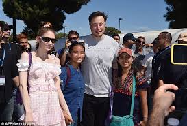 While elon musk does not have a wife, he has been in a relationship with canadian singer grimes (real name claire boucher) for over three years. Twitter Users Claim Grimes Looks Like Elon Musks Daughter In Photo Elon Musk Grimes Kids Blog