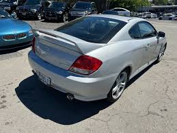 Image result for Ebony Black 2005 Tiburon