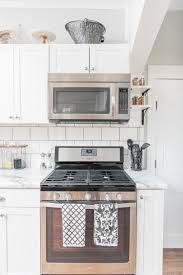 Lowe S Stock Cabinets Review Diamond Now Arcadia White Shaker Cabinets Elizabeth Bur Diamond Kitchen Cabinets Lowes Kitchen Cabinets Diy Kitchen Renovation