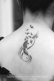 Feather With Birds Freedom Tattoo By Sunny Bhanushali At Aliens Tattoo Mumbai Www Alienstattoos Com Tattoo Tatt Tattoo Freiheit Hals Tattoos Nacken Tattoo
