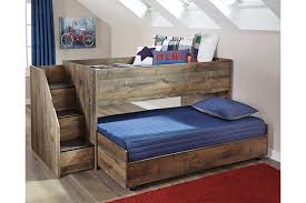 In any bedroom, this bed has great modern farmhouse character for your living area. Trinell Twin Loft Bed With Pull Out Caster Bed Ashley Furniture Homestore