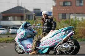hiroe kobayashi on suzuki skywave dream factory scooter custom moped motorcycle women