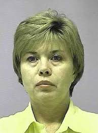 Hall woman accused of embezzling $1 million