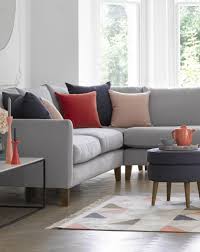 Light peach on your living room walls is an easy and effective way of making your space look warm and cheery without being overwhelming. A Square Arm Sofa Is The Perfect Choice If Space Is Tight In Your Living Room This Sty Living Room Decor Gray Luxury Living Room Decor Brown Living Room Decor