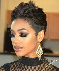 Chanel iman asymmetrical bob haircut for black women. African American Asymmetrical Bob