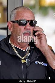 The father of former Bandidos enforcer Toby Mitchell, leaves the Melbourne  Magistrate's courts, Wednesday 14 Jan. 2015. Toby Mitchell will appear in  court accused of threatening to kill a man and baby