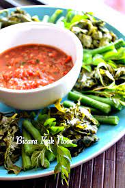 Sambal is a chili sauce or paste, typically made from a mixture of a variety of chili peppers with secondary ingredients such as shrimp paste, garlic, ginger, shallot, scallion, palm sugar, and lime juice. Sambal Belacan Thailand Style Bicara Kak Noor Recepten