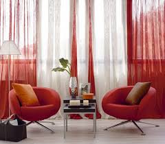 This dining room has a gallery wall filled with four bold pieces. How To Choose Curtains For The Living Room Hall 50 Ideas