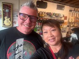 My wife Amanda McLaren with Chad Beeler, owner of The Bass Shop in Seattle,  one of the best bass shops around. She flew up there for a cousin's wedding  and spent her