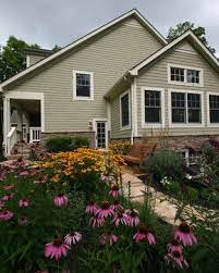 Perhaps that's why a gray house blends so beautifully with its surroundings, whether set on a lush manicured lawn or nestled in the woods. What Color Is The Siding Exterior Paint Colors For House Traditional Exterior House Paint Exterior