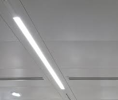 Integrated Linear Lighting Within A Suspended Ceiling Grid Office Interior Design Linear Lighting Ceiling System