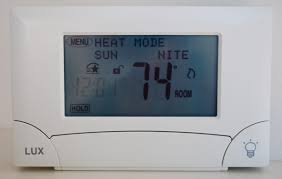 Set the clock and finally the program. Programmable Thermostat