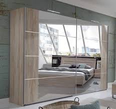 Add a touch of timeless elegance to your home with our latest mirror wardrobe range. Wimex German Davos Oak Chrome Mirror 2 Door 225cm Sliding Slider Door Wardrobe Mirrored Wardrobe Sliding Doors Bed In Living Room