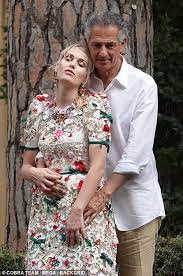 Princess diana's niece lady kitty spencer, 30, shares a kiss with new husband billionaire fashion tycoon michael lewis, 62, at their lavish black tie guests were pictured departing their hotel to attend the wedding between lady kitty spencer and her billionaire beau michael lewis in rome. X5yqfvmezitjnm