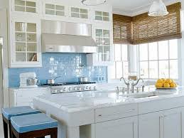 glass tile backsplash white cabinets